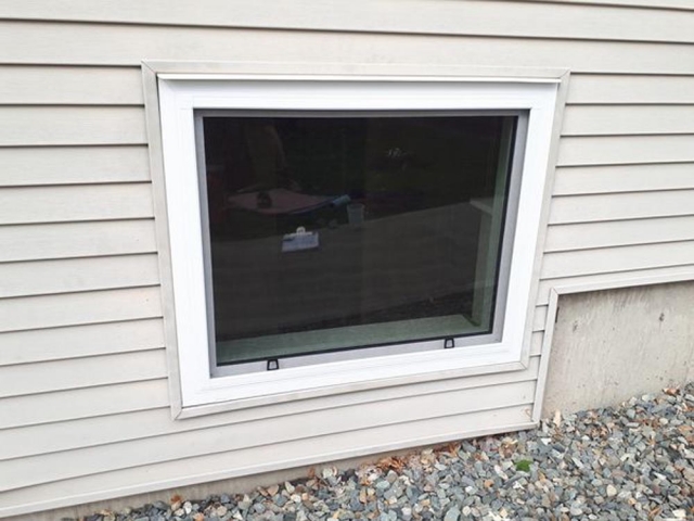 A newly installed window for the basement