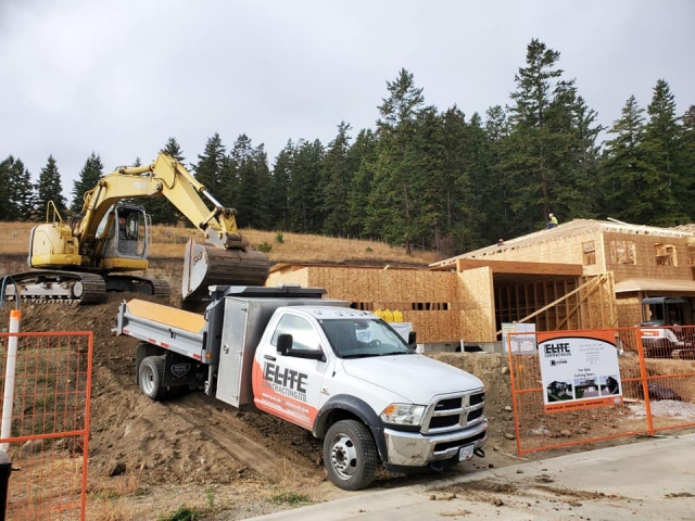 Elite's home excavation contractors working on a custom home project